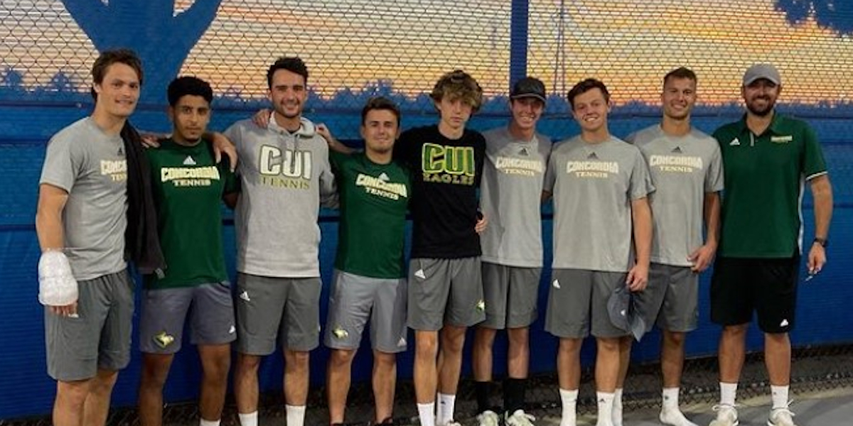 Caption: CUI Men’s tennis team poses for team photo